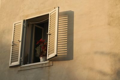 Low angle view of house window