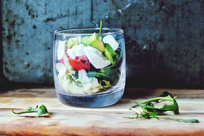 Close-up of salad in glass on table