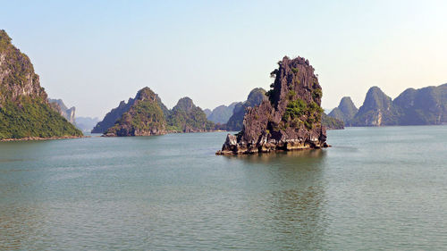 Scenic view of sea with mountains in background