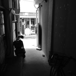 Full length of man walking in alley