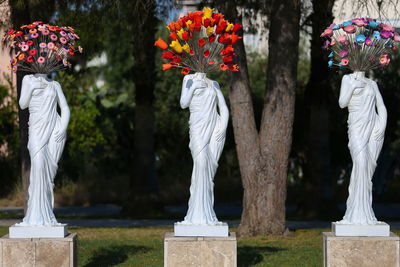 Statue of people at park