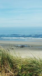 Scenic view of calm sea against sky