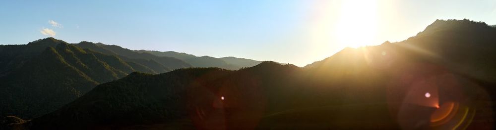 Scenic view of mountains against sky during sunset