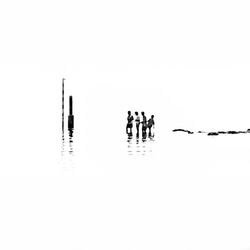 Silhouette of woman against clear sky