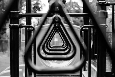 Close-up of empty seats in playground