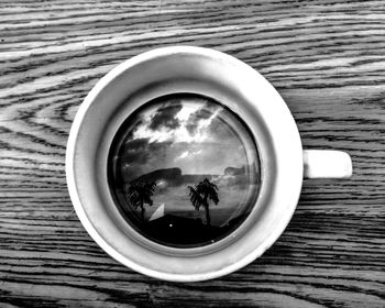 Directly above shot of coffee cup on table