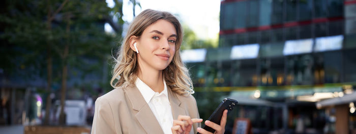 Young woman using mobile phone