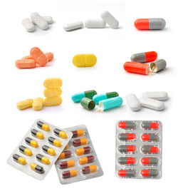 Close-up of medicines on white background
