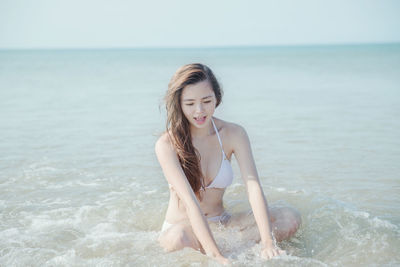 Portrait of woman in sea