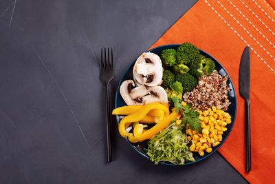 High angle view of vegetables in plate on table