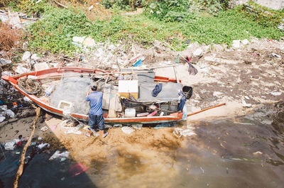 High angle view of people working on plants