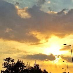 Low angle view of cloudy sky at sunset