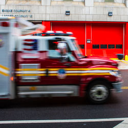 Blurred motion of vehicles on road in city