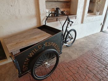 High angle view of bicycle by building