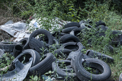 Close-up of abandoned truck on field