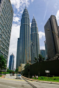 City street against cloudy sky