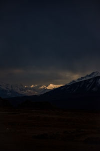 Scenic view of mountains against sky during sunset