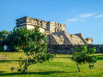 View of castle against cloudy sky