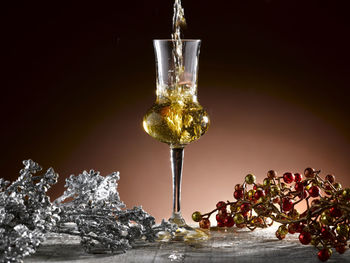 Close-up of water splashing on glass