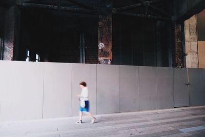 Full length of man standing in building