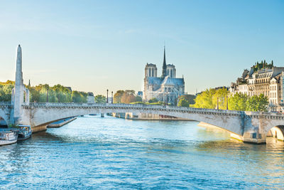 Notre dame de paris - view from bridge on seine river before fire april 15, 2019