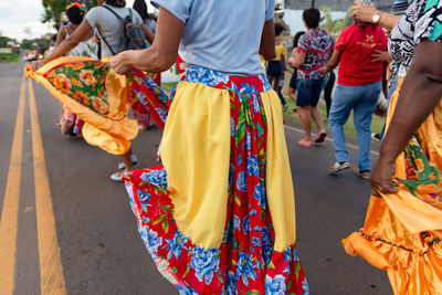 Women are seen dancing during the levada do mastro to honor saint peter 