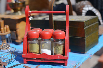 Various ingredients in bottles on table during sunny day