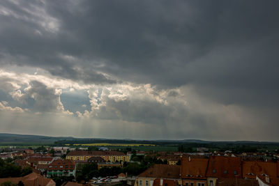 Aerial view of townscape against sky