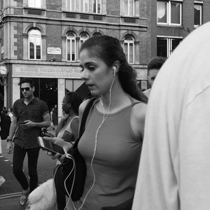 Woman standing on street