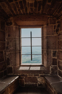 View of mountains seen through window