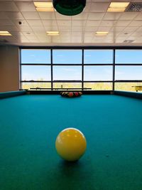 Yellow ball on table