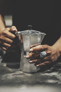 Close-up of hand holding drink
