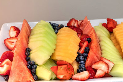 Full frame shot of multi colored fruits in plate