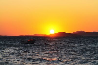 Scenic view of sunset over sea