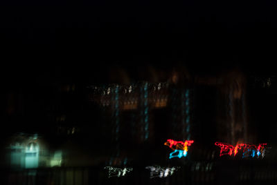 Illuminated red lights at night