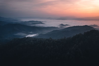 Scenic view of mountains against sky during sunset