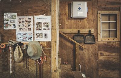 Information sign and hats in barn