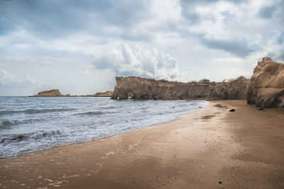 Scenic view of beach against sky