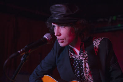 Guitarist performing at a nightclub