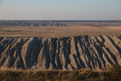 Scenic view of land against sky