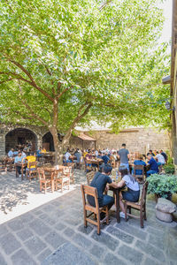 Group of people at outdoor cafe