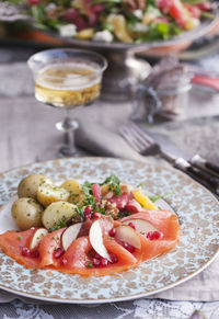 Fish and potatoes on plate