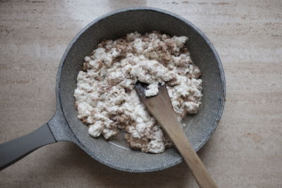 Close-up of breakfast in saucepan on table