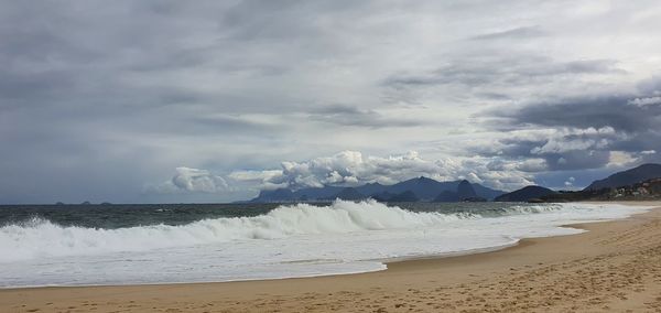 Panoramic view of beach against sky