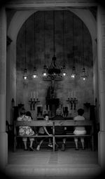 People sitting in a chapel 