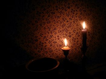 Close-up of lit tea light candle