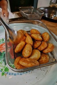 High angle view of person preparing food on table