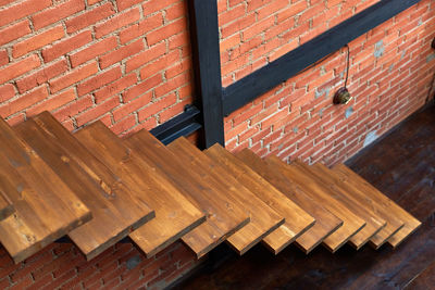 Stairs in loft apartment. staircase without railing. modern hipster style attic loft apartment