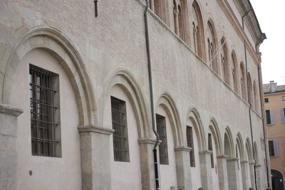 Low angle view of old building against sky