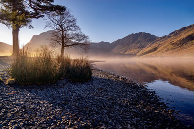 Scenic view of lake against clear sky